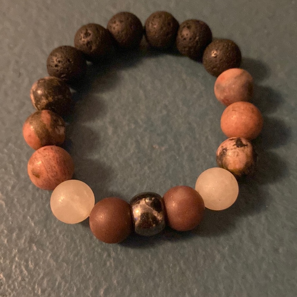 ladies essential oil bracelet featuring lava beads.